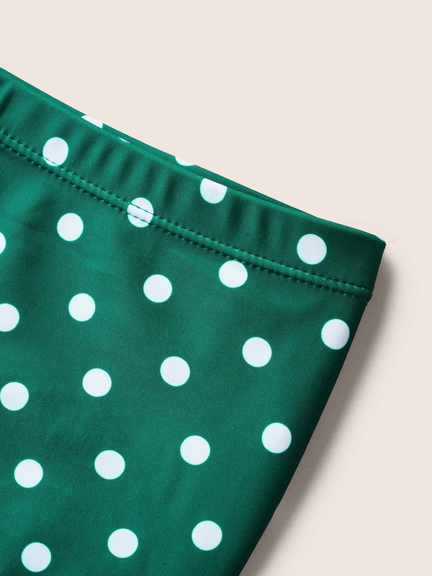 Polka Dot Crossover Ruched Flutter Hem Swim Dress - Image 6